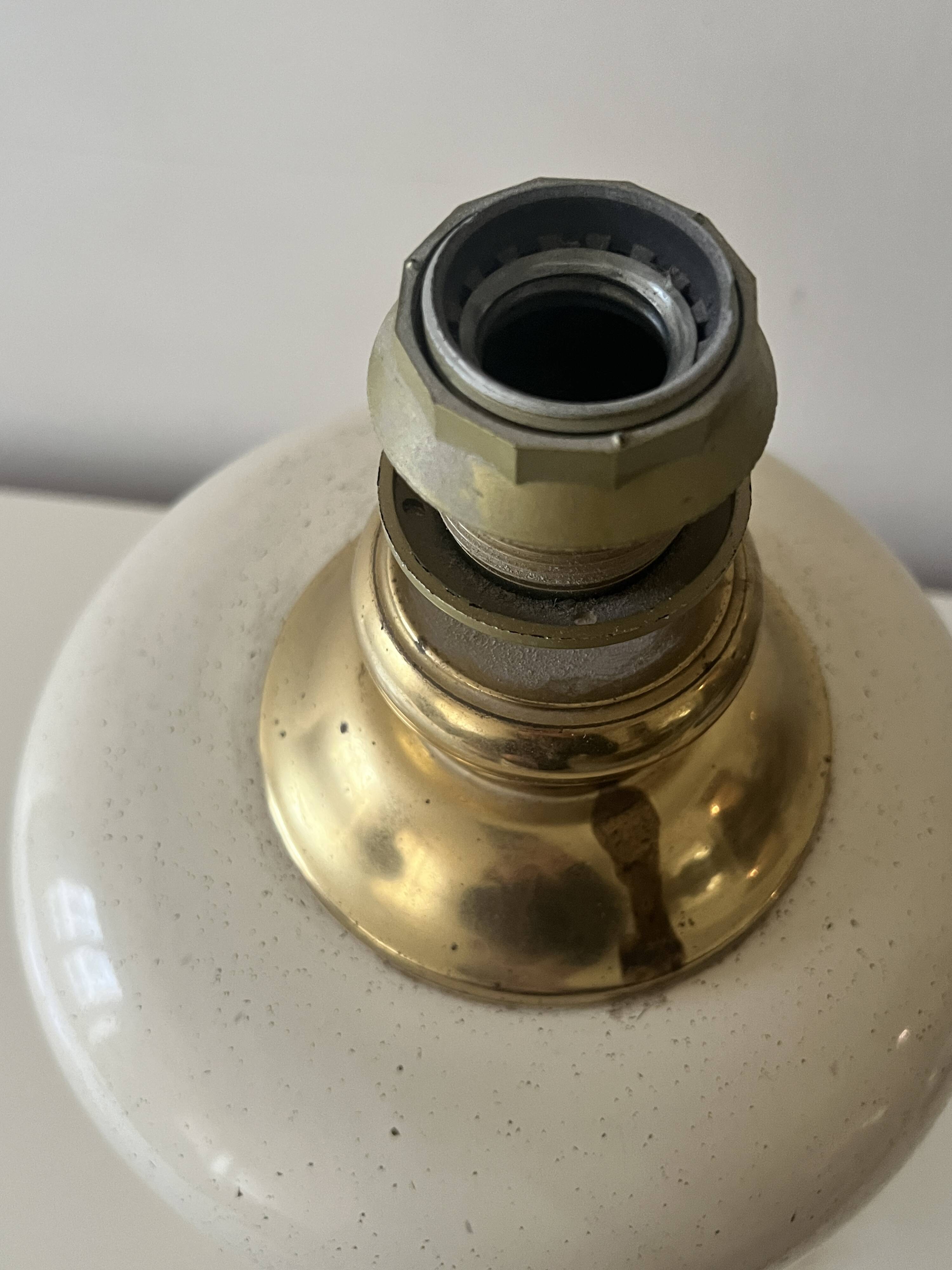 Dolphin lamp model "Oricourt" in ceramic and brass, France 1970.