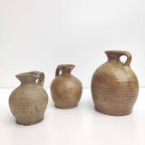 Set of three sandstone pitchers