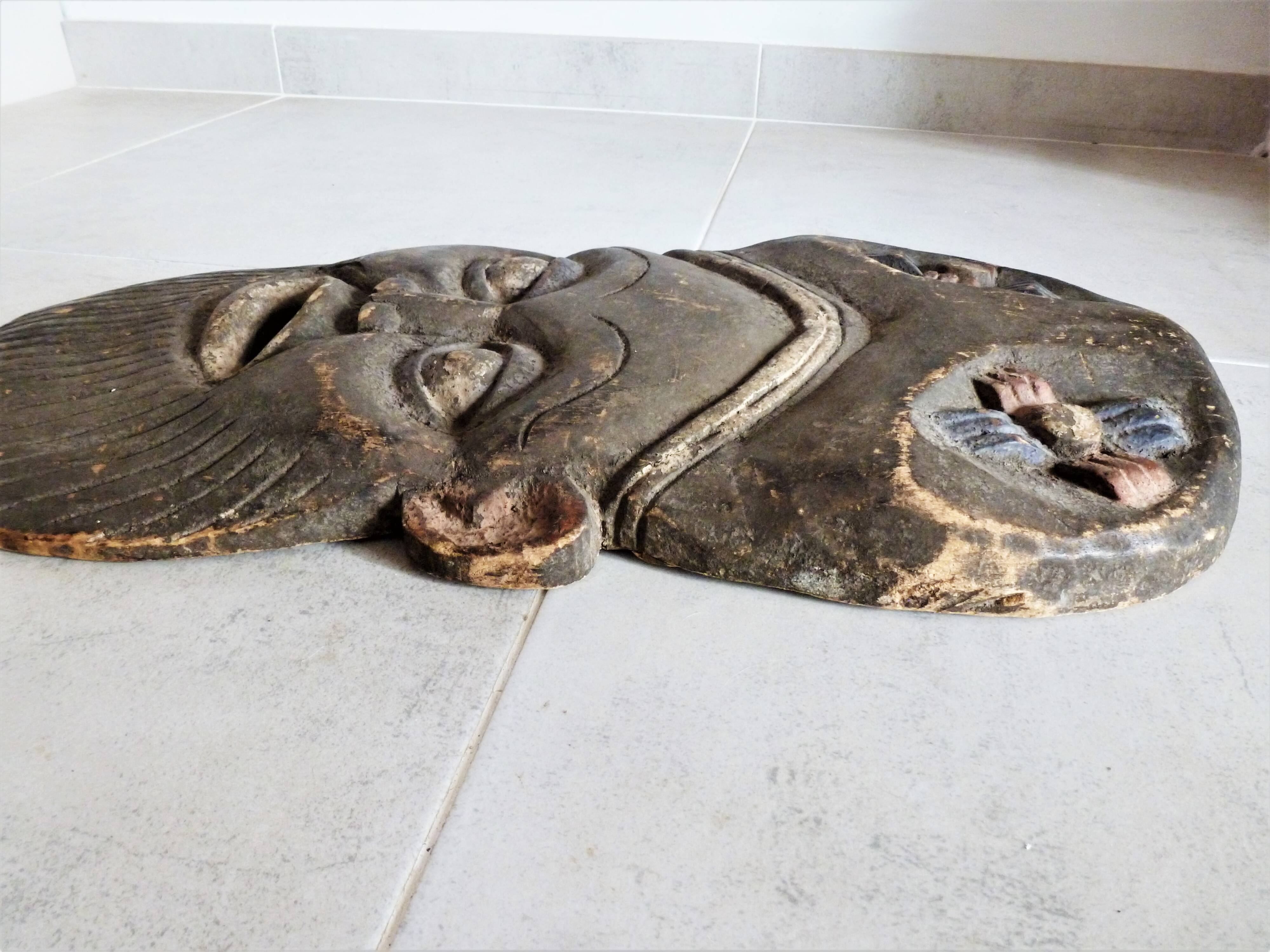 African mask, Hand-carved African wooden mask.