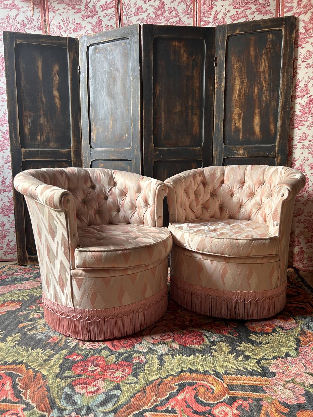 Pair of Hollywood Regency style cabriolet armchairs in satin pink, 1970s.