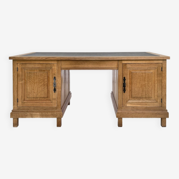 Important double-sided desk in oak and leather