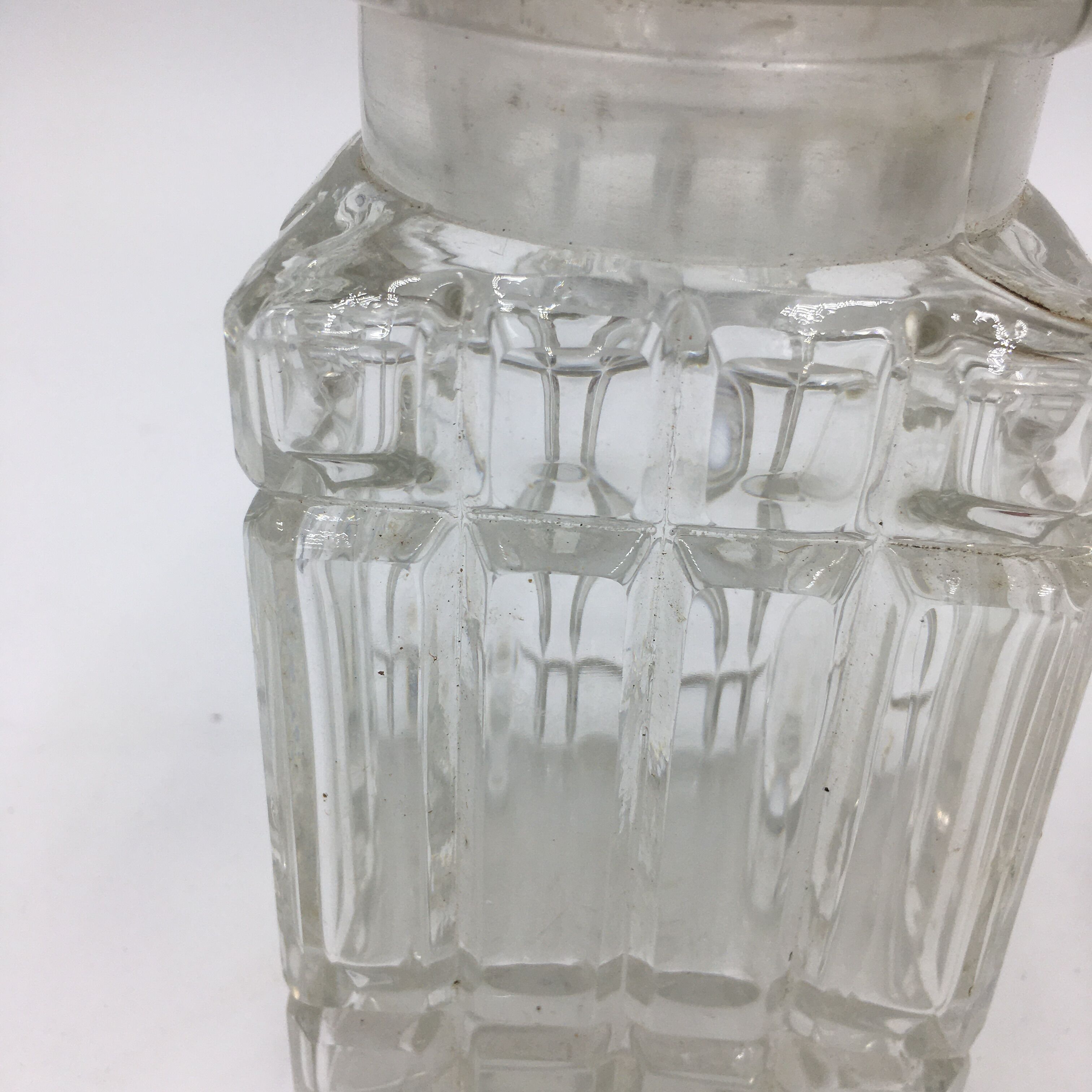 Duo of chiseled glass jars