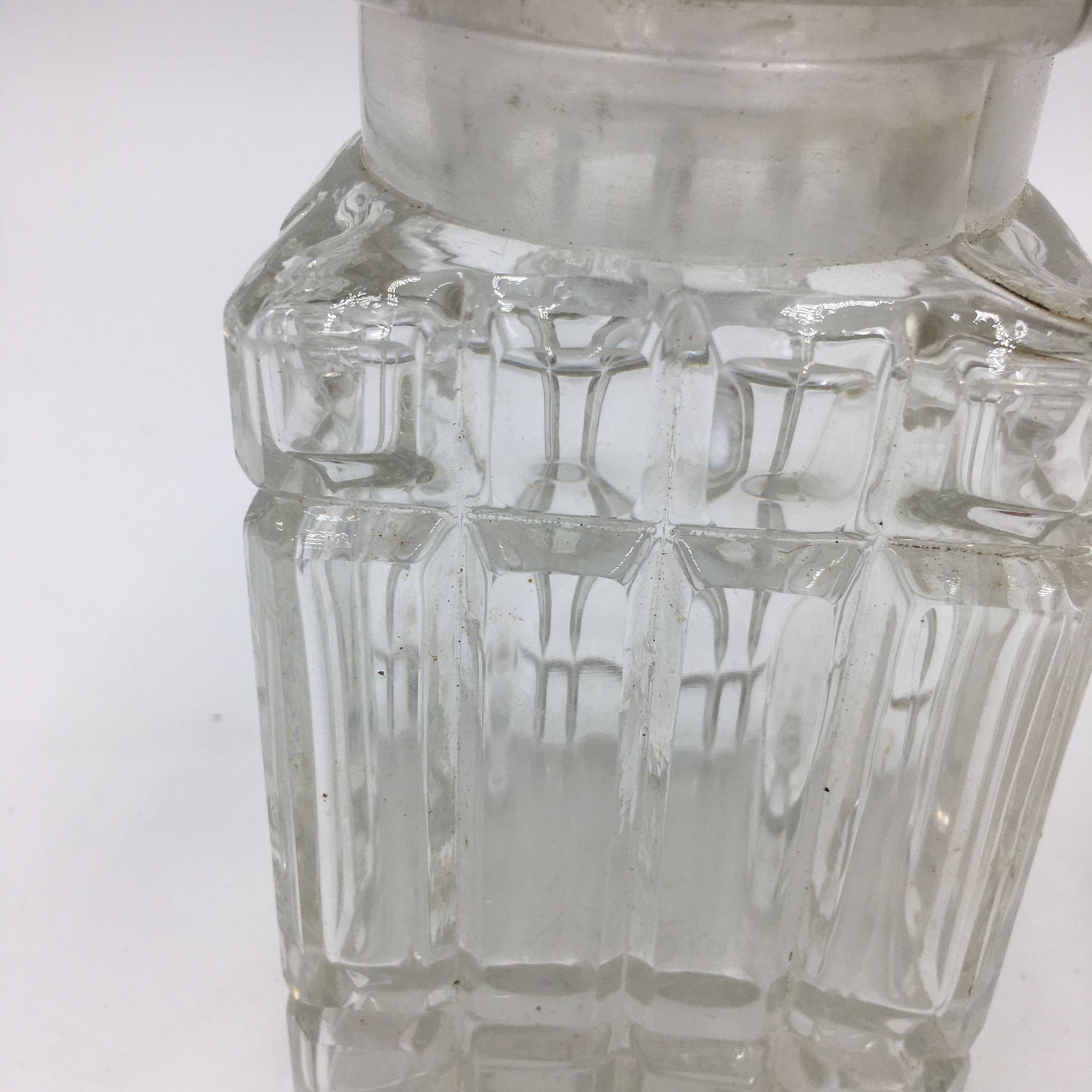 Duo of chiseled glass jars