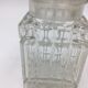 Duo of chiseled glass jars
