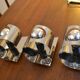 3 70s chrome metal wall lights