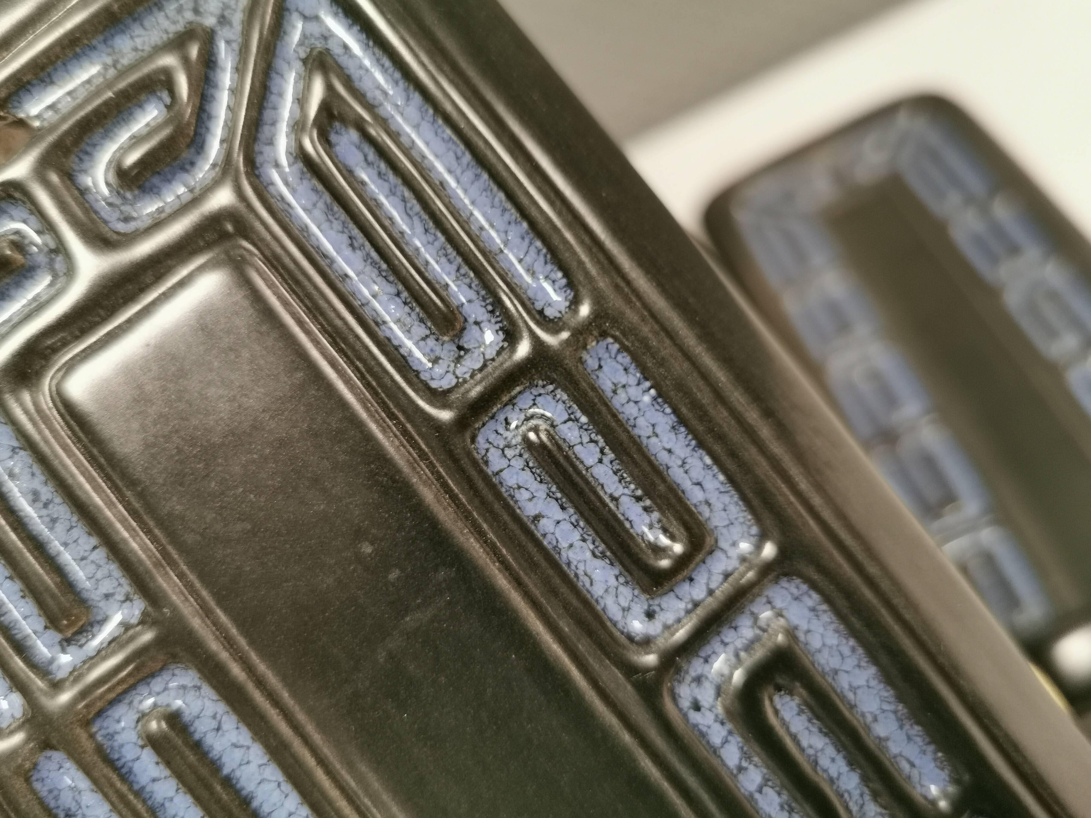 Two wall-mounted candlesticks by Danish Frank Ceramics 1970s.