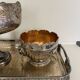 set of 3 silver metal chisel bowls with their tray