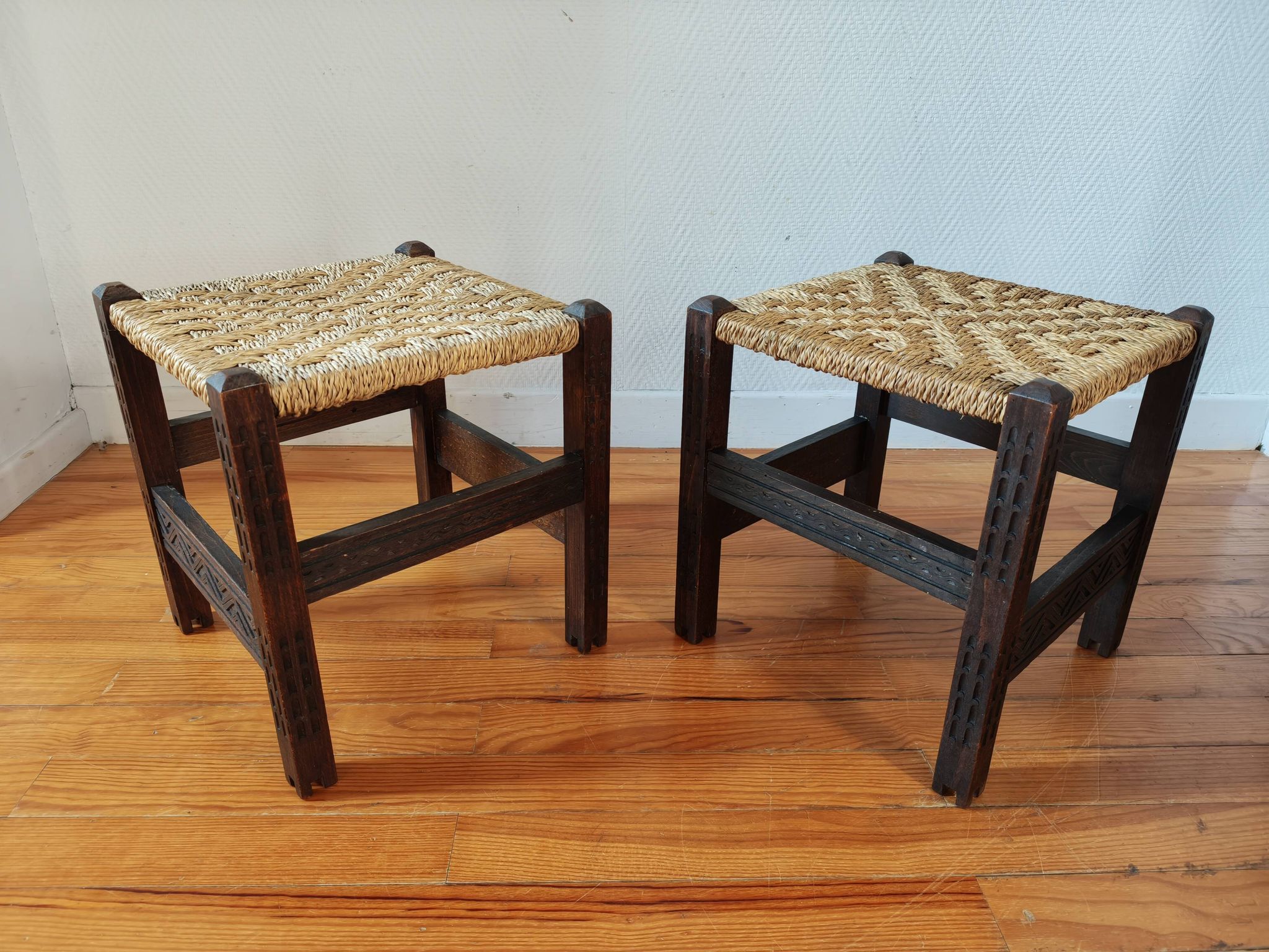 Pair of handcrafted stools from Friuli in carved wood, Italy, circa 1960.