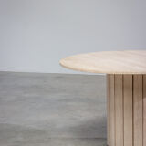 Circular modernist dining table in travertine 1970
