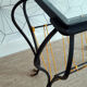 Vintage magazine holder "scoubidou" in black wrought iron.