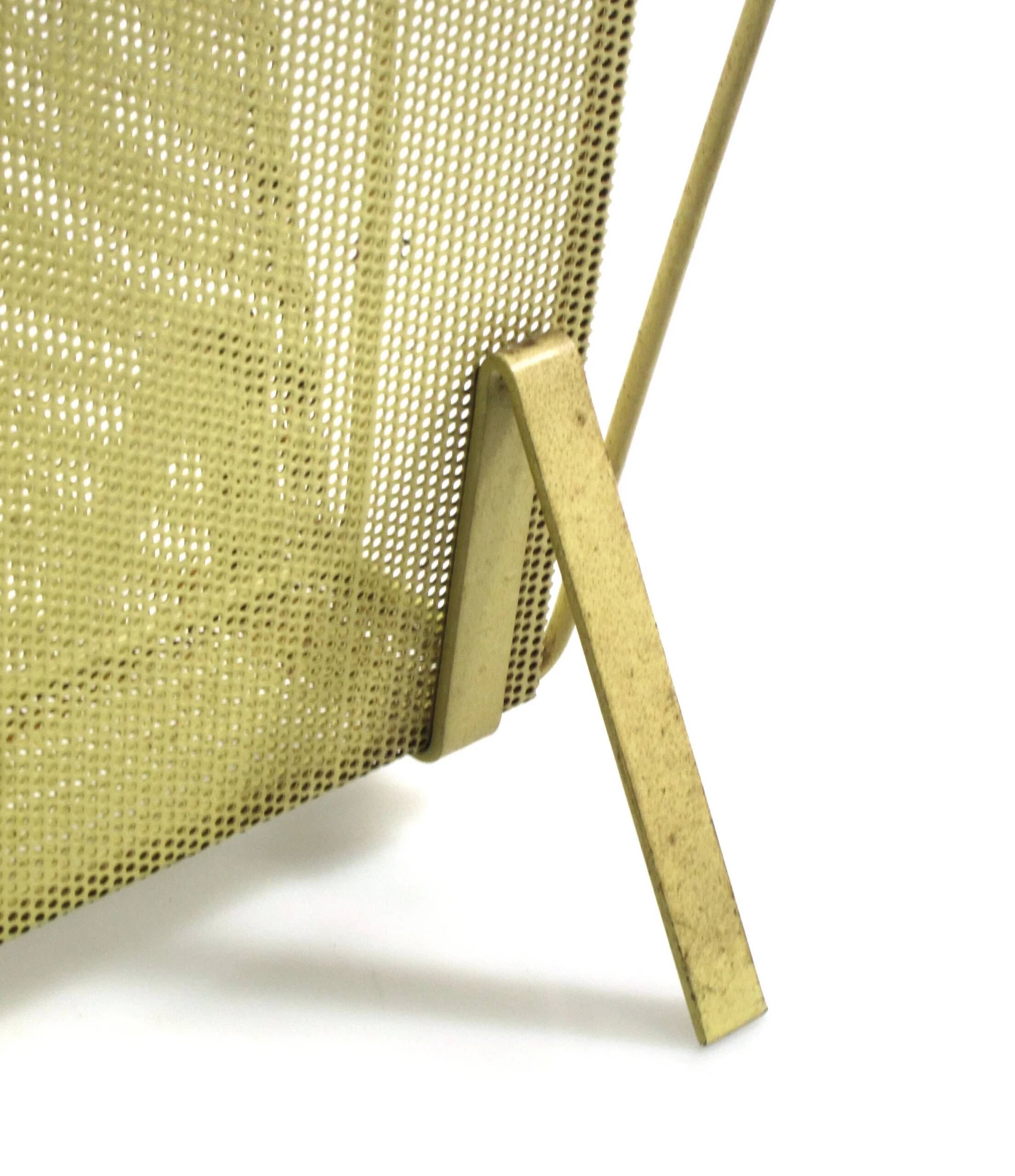 Compact yellow Mathieu Mategot 1960s magazine rack for Artimeta
