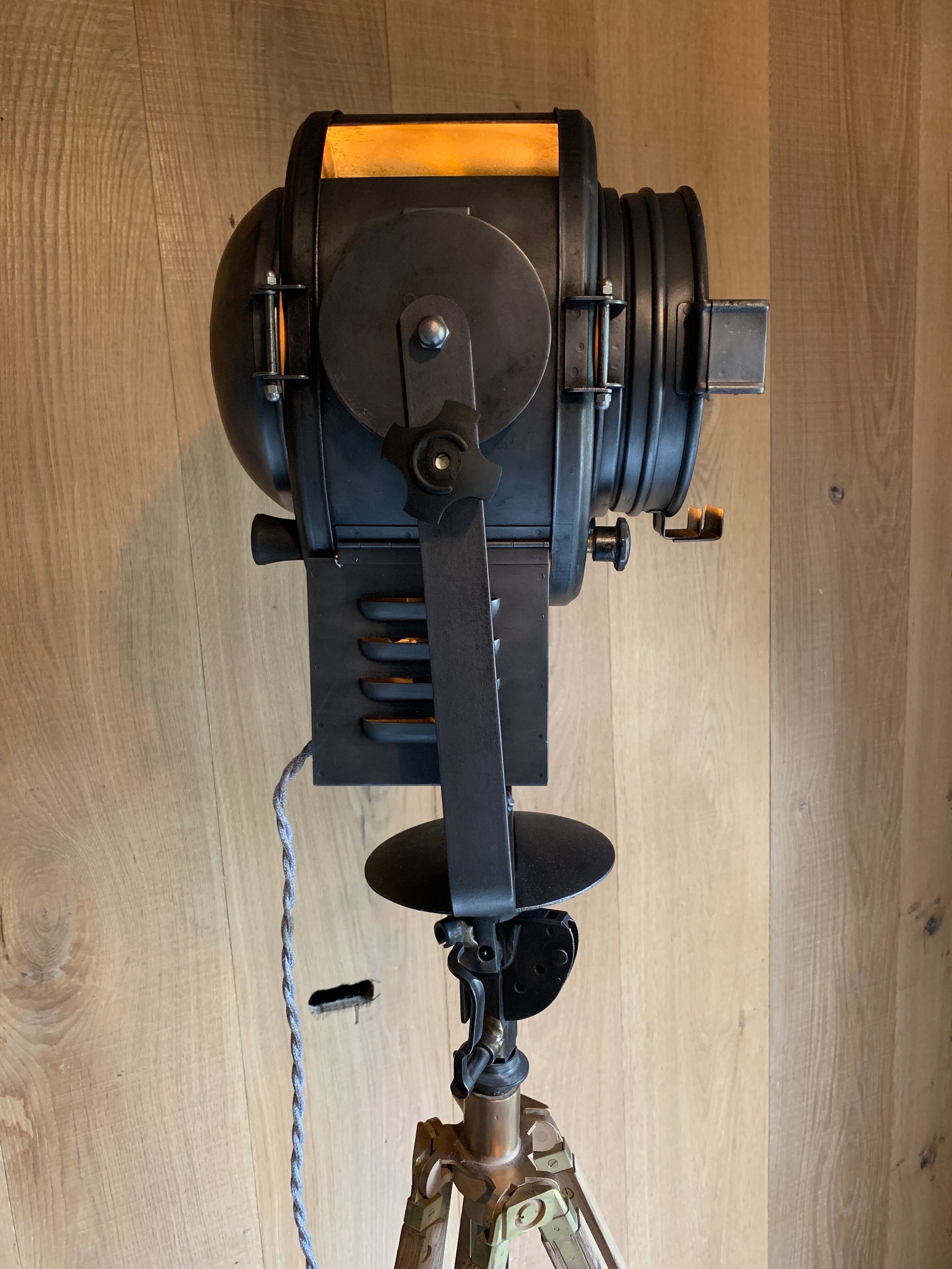Cinema projector A.E Cremer Paris on its adjustable wooden foot circa 1960