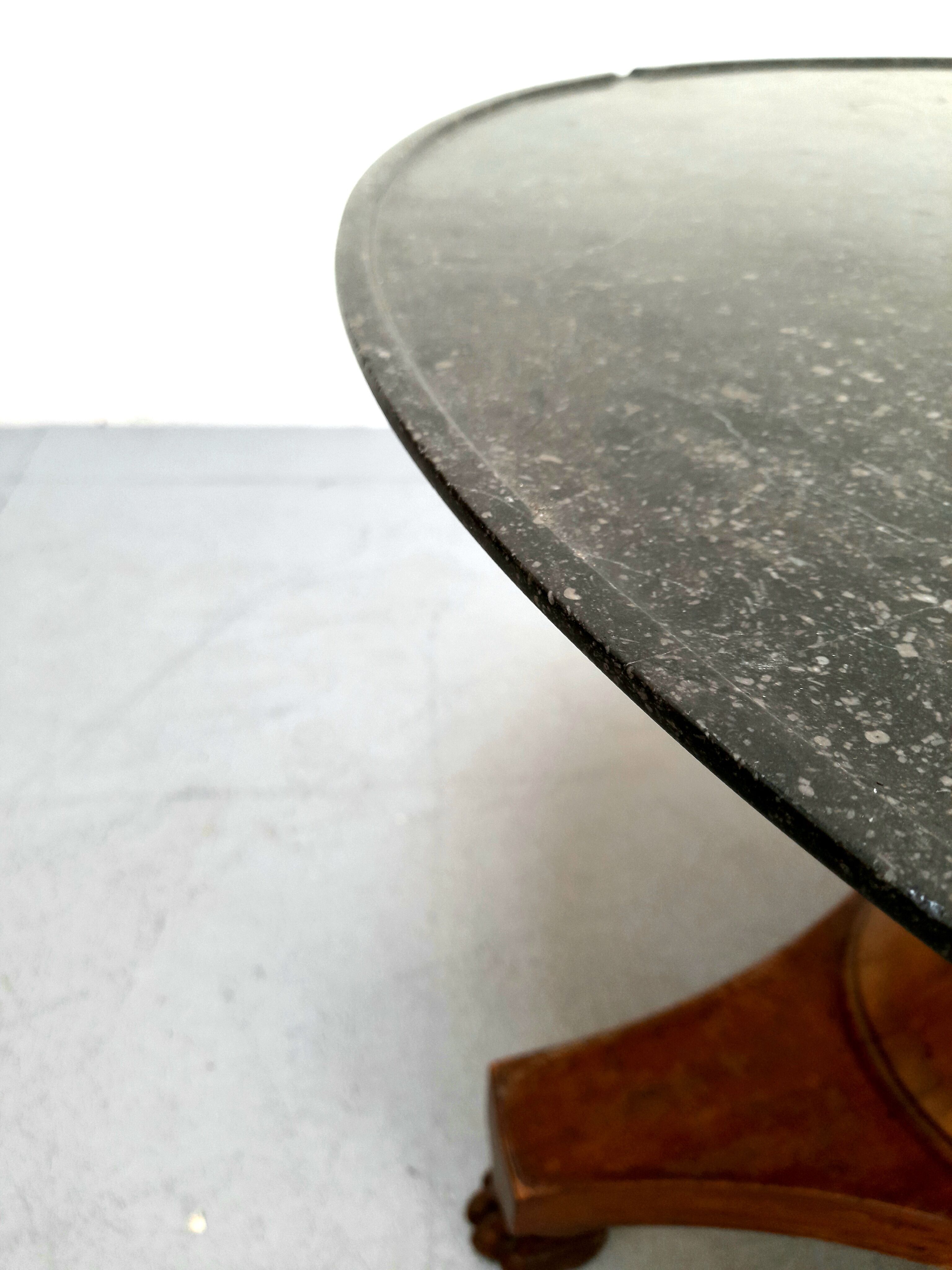 Neo-classical pedestal table in walnut and black marble - French work from the 1930s