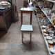 Formica table with tapered wooden legs + stool