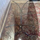 Contemporary glass and chrome dining table.