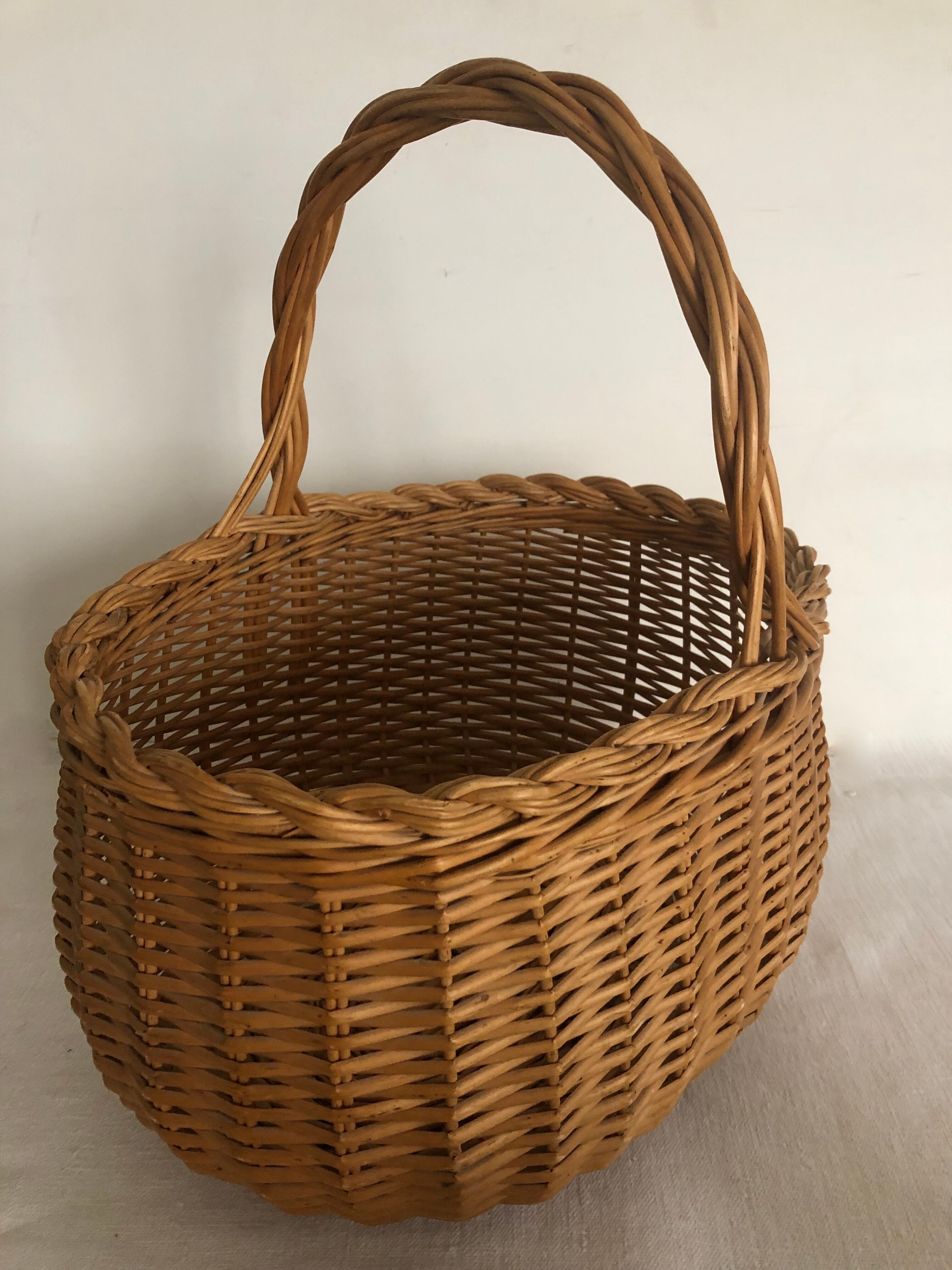 Braided wicker oval basket