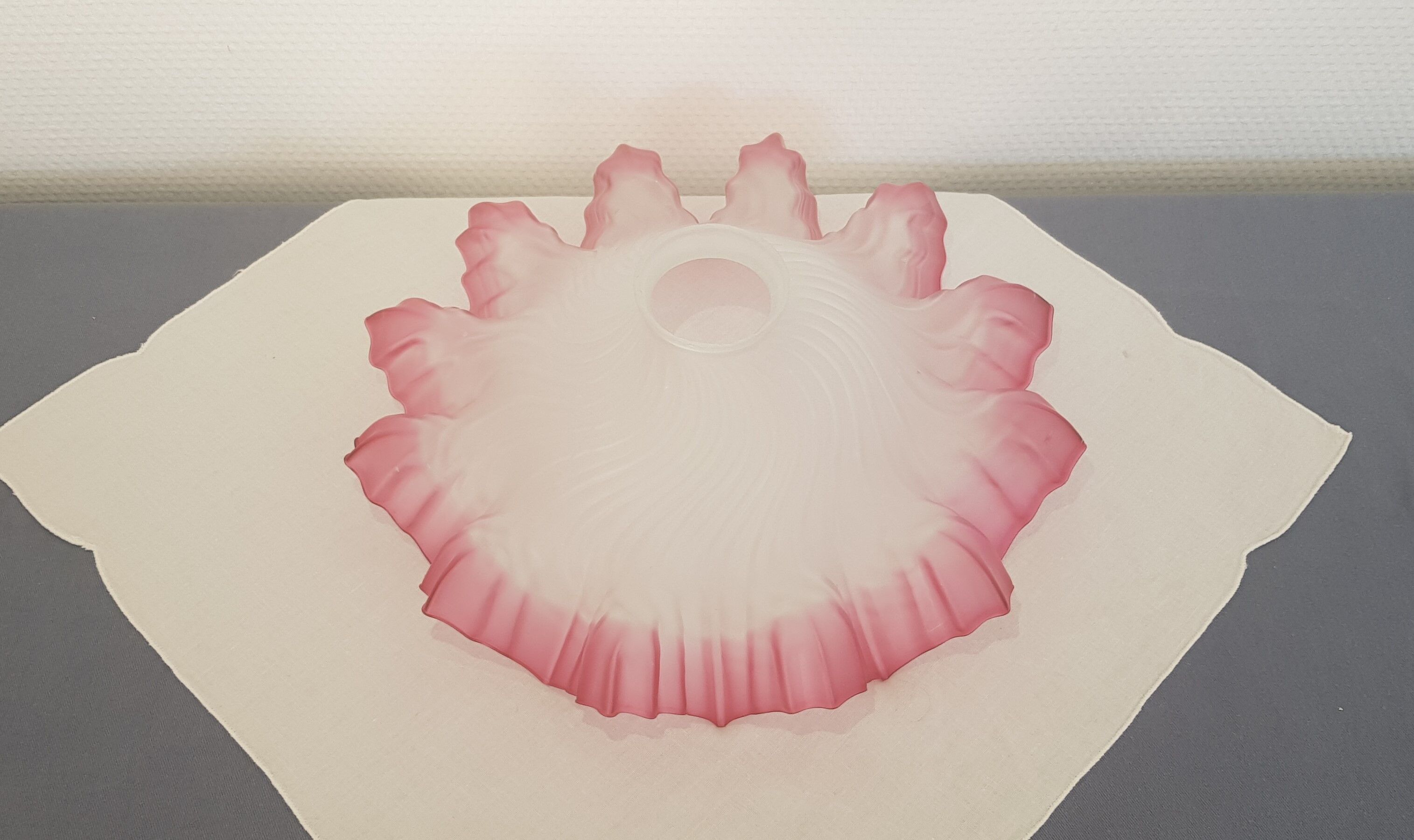 Old glass and pink lace lampshade