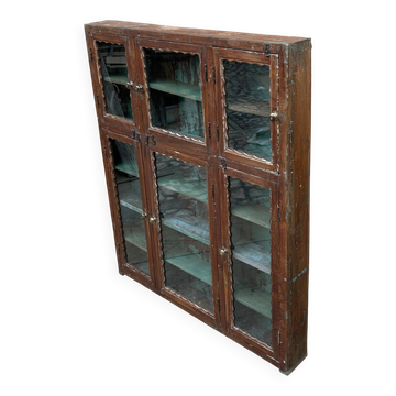 glass library in Burmese teak