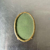 Metal gold colored oval picture frame brass