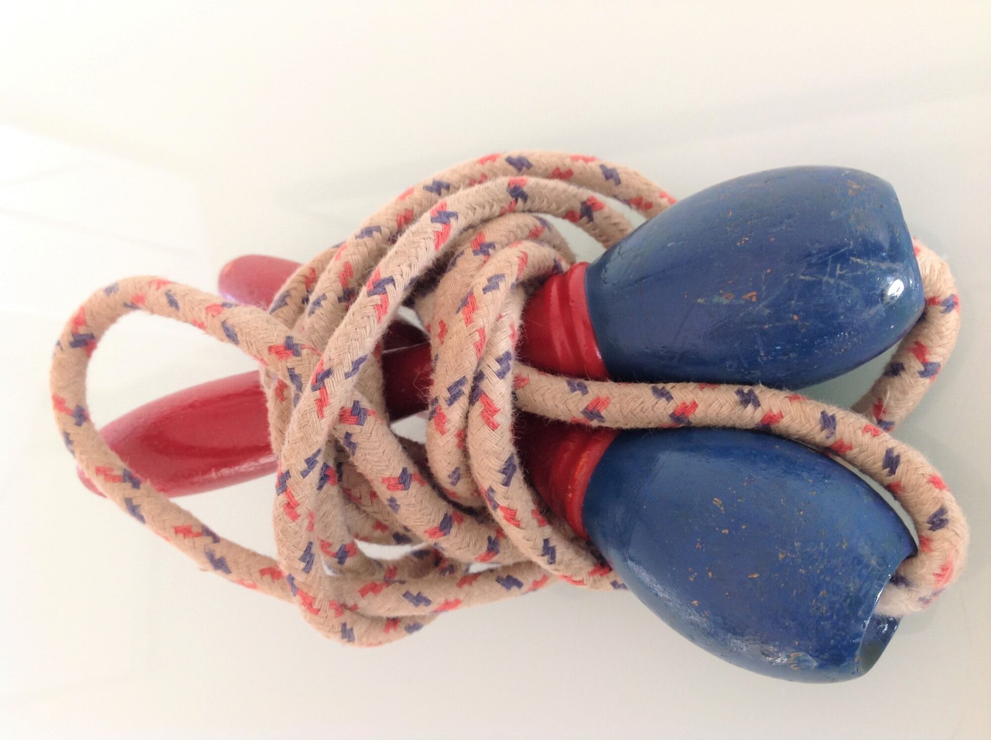 Old wooden jump rope red and blue / vintage