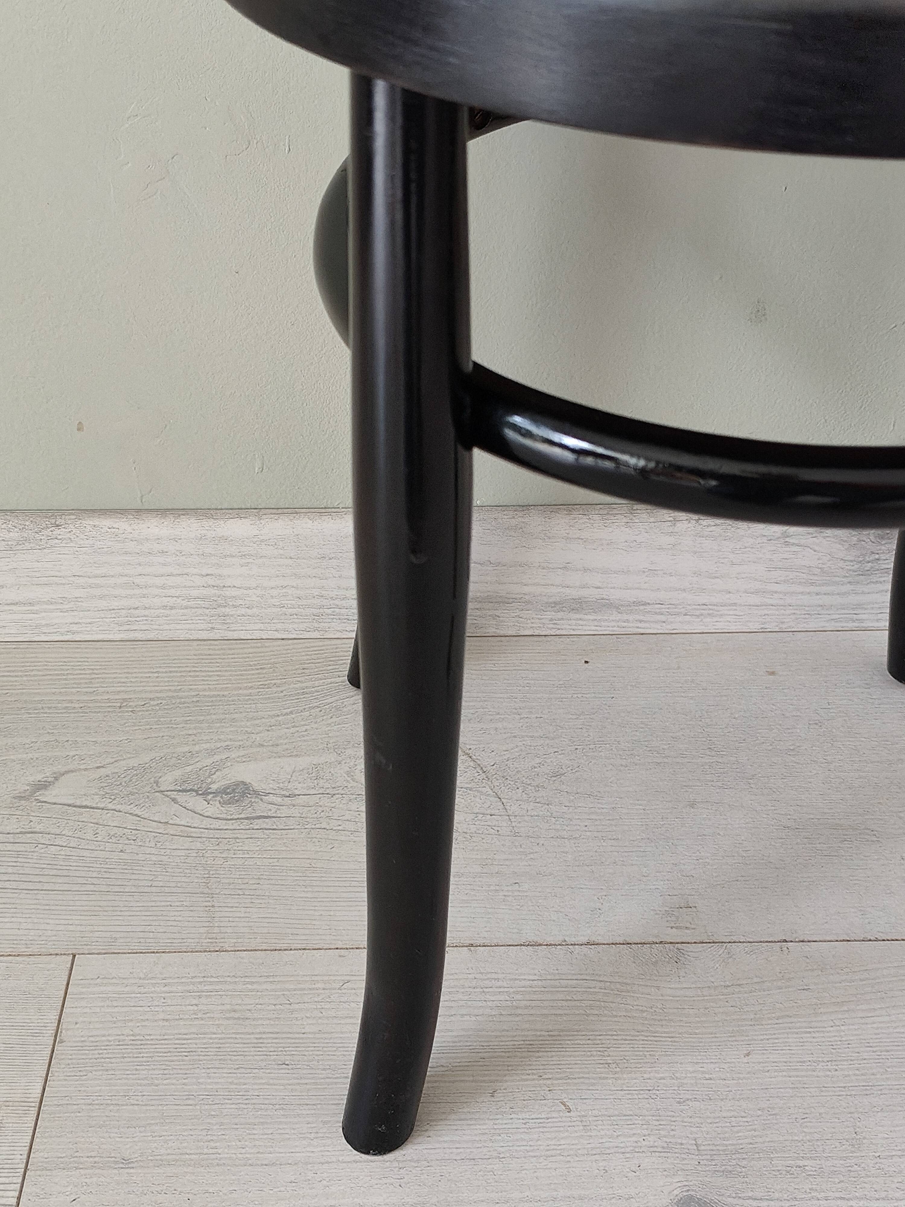 Stool in the style of Thonet made of solid wood.