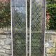 Pair of old double stained glass doors. Metal frames. Stained glass windows