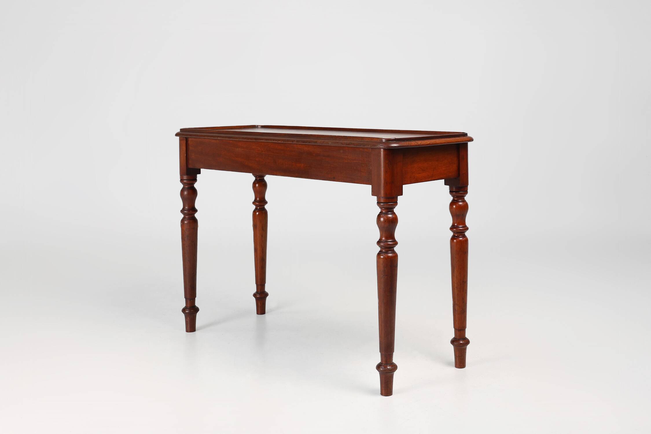 Elegant Mid 19th century English side table in full wood