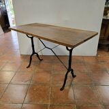 Old bistro table with oak top, cast iron base, 118 cm L