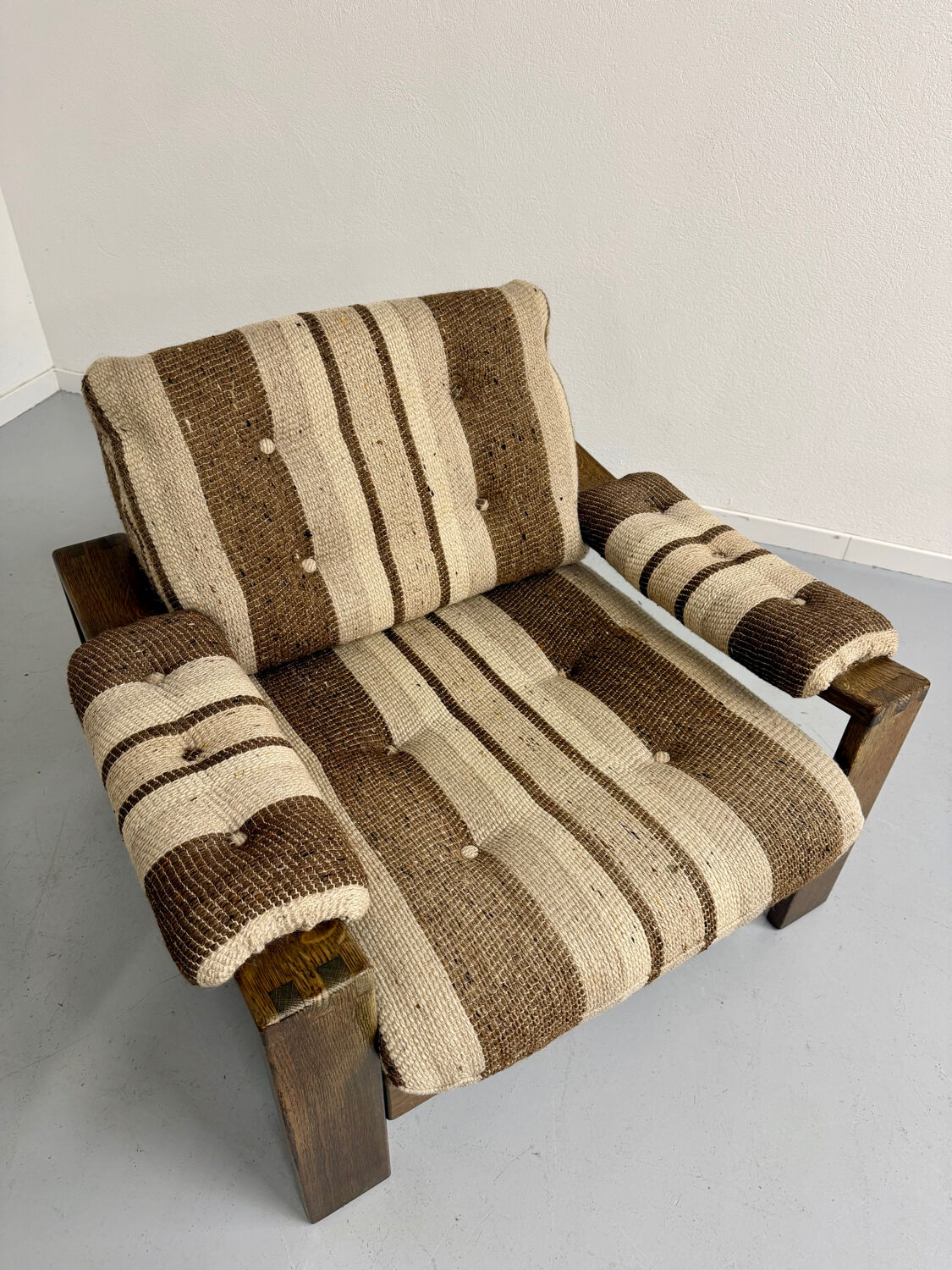 2 vintage 1970s wooden and fabric armchairs