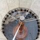 Turned wooden floor lamp with lampshade