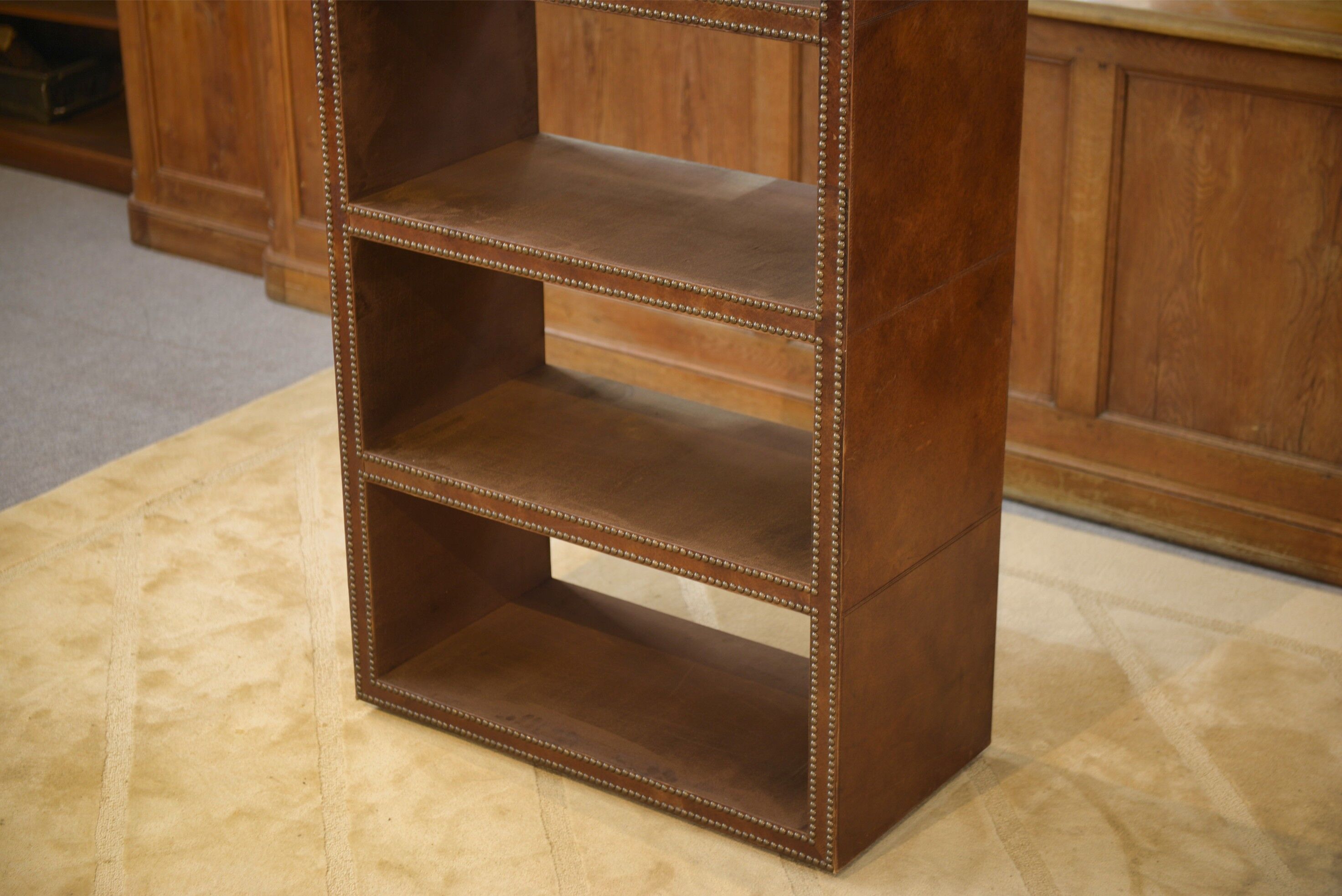 Studded faux leather shelf