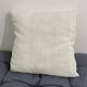Coussin carré en toile ancienne style kilim tissé, patché, monogramme AB