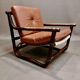 Fauteuil et son ottoman rotin et cuir 1950