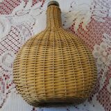 Vintage wicker covered flat bottle