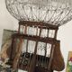 Decorative bird cage of iron and wood