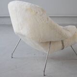 Womb Chair and Ottoman in fluffy white fabric by Eero Saarinen