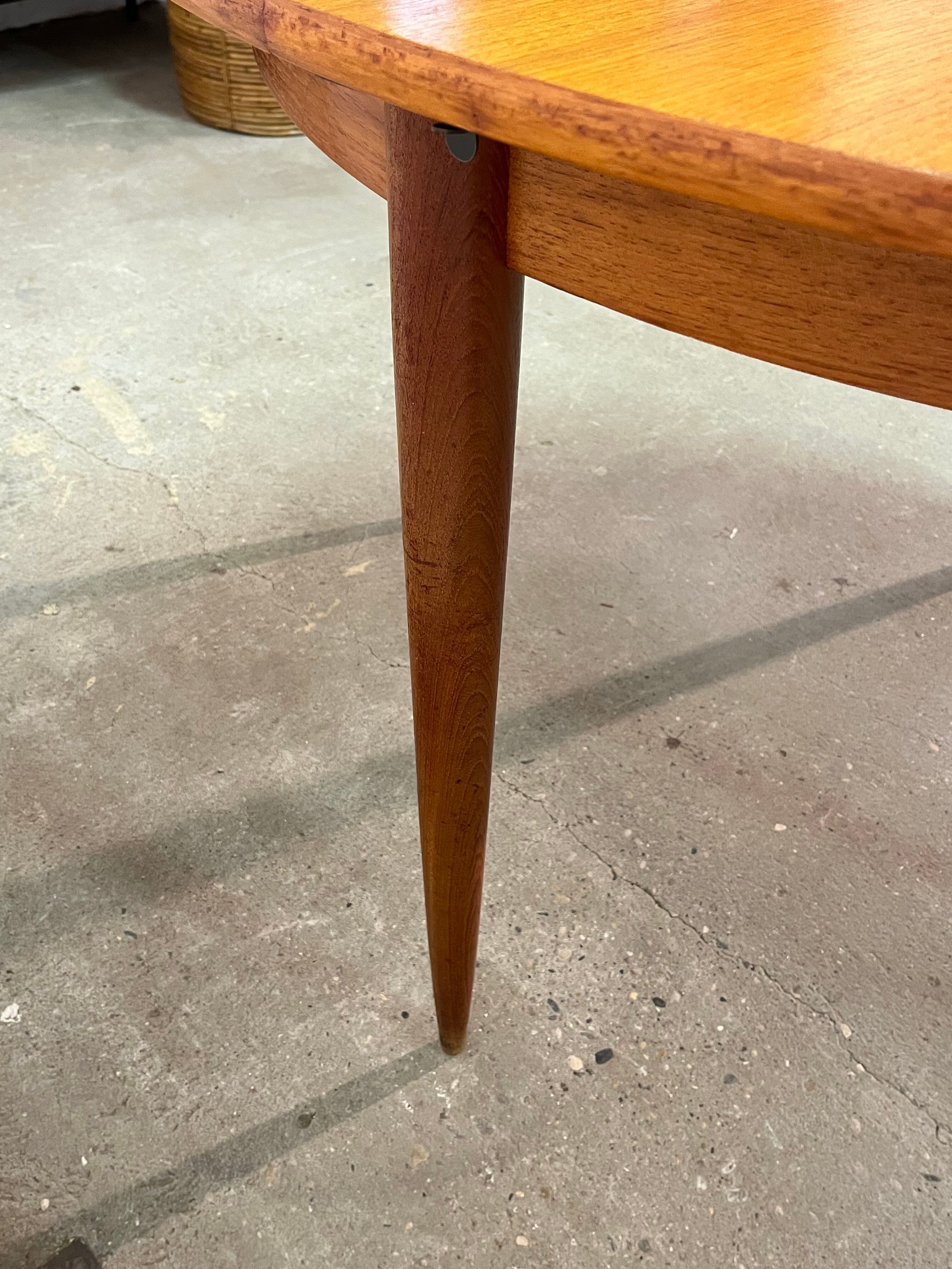 Vintage 1960s teak extendable Scandinavian table.
