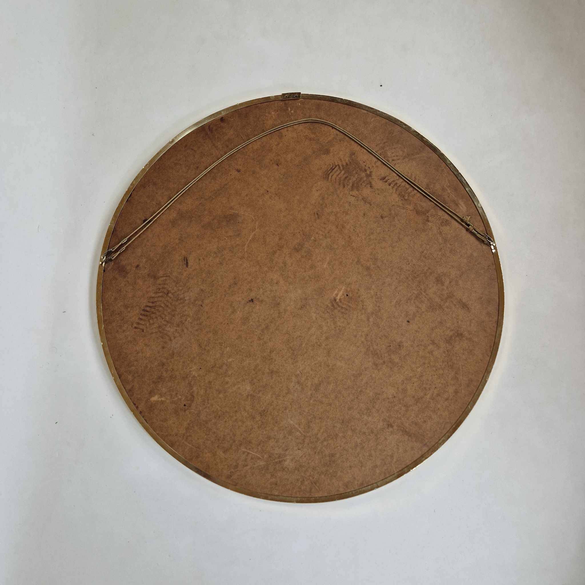 Grand miroir mural rond des années 60.