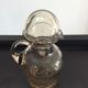 Vintage decanter made of blown glass paste