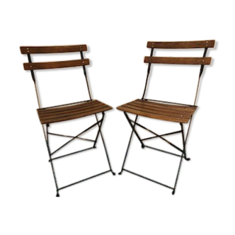 Wooden and wrought iron bistro chairs