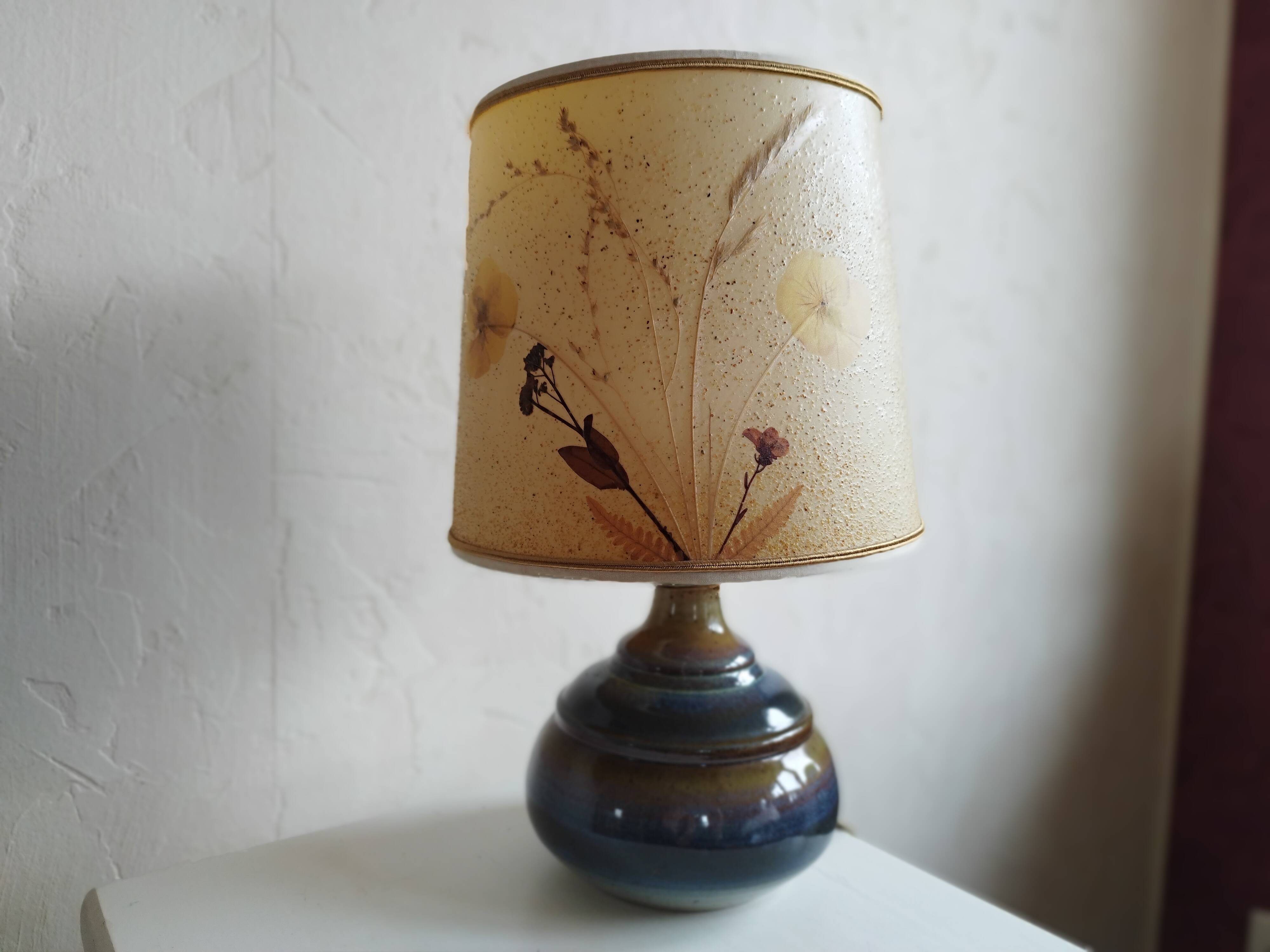 Sandstone lamp and dried flowers