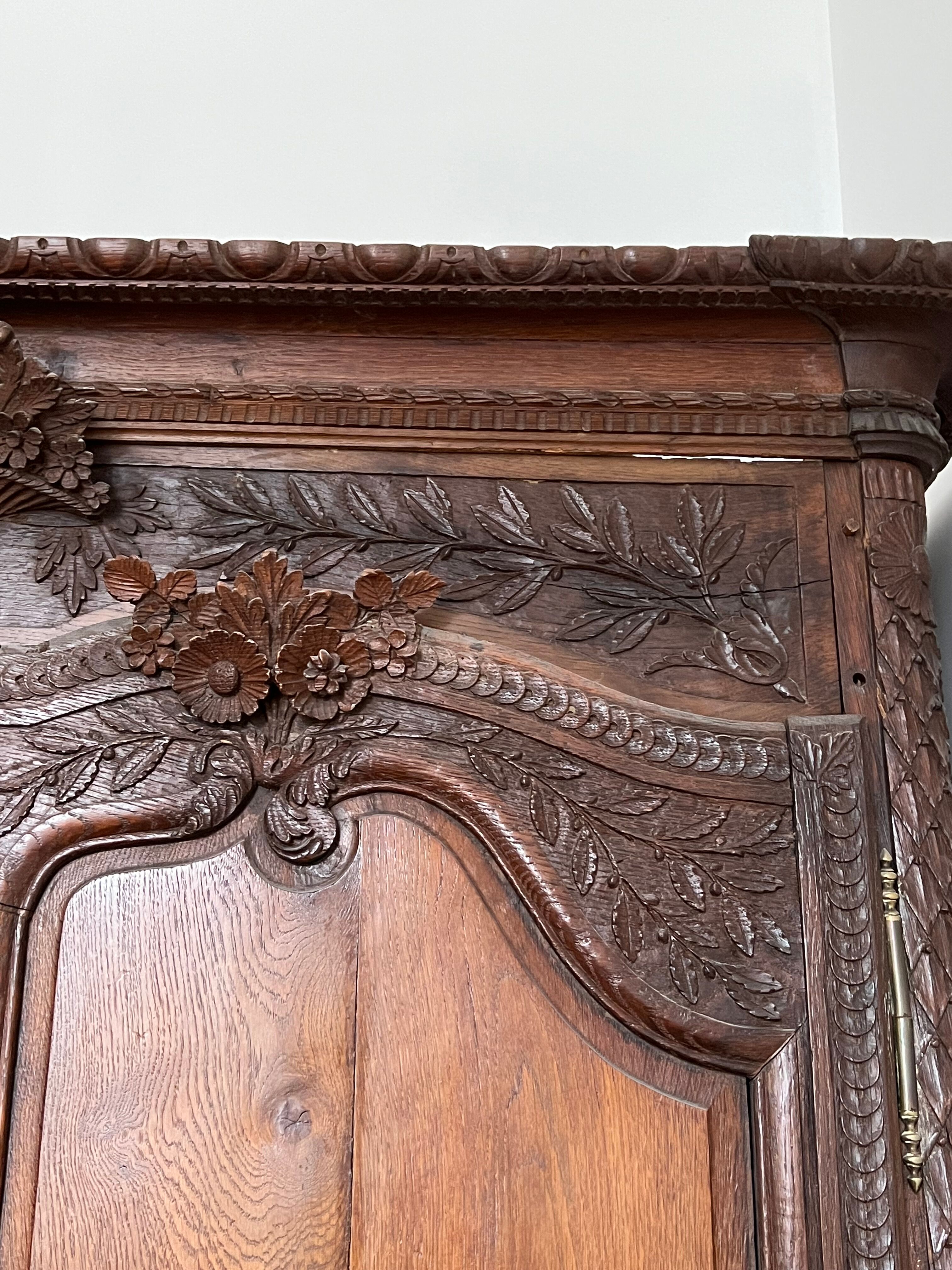 Beautiful and ancient Norman wedding wardrobe, richly carved