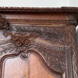 Beautiful and ancient Norman wedding wardrobe, richly carved