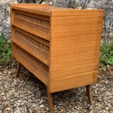 Rattan wardrobe and its compass-legged chest of drawers, 1960