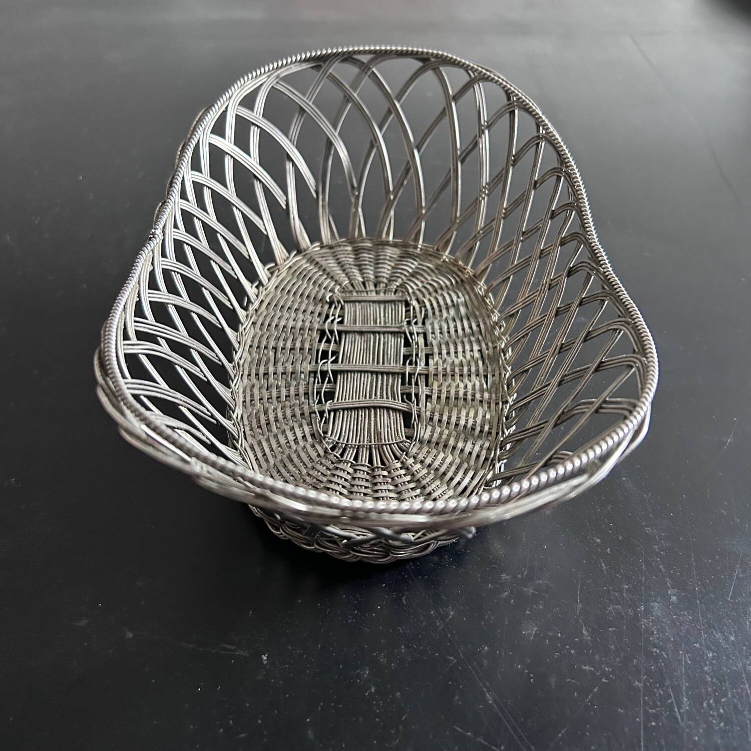 Silver woven metal basket