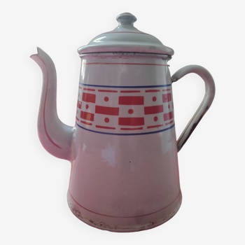 White enamelled sheet metal coffee maker with red and blue patterns