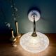 Vintage glass wall lamp with a white Clichy shade.