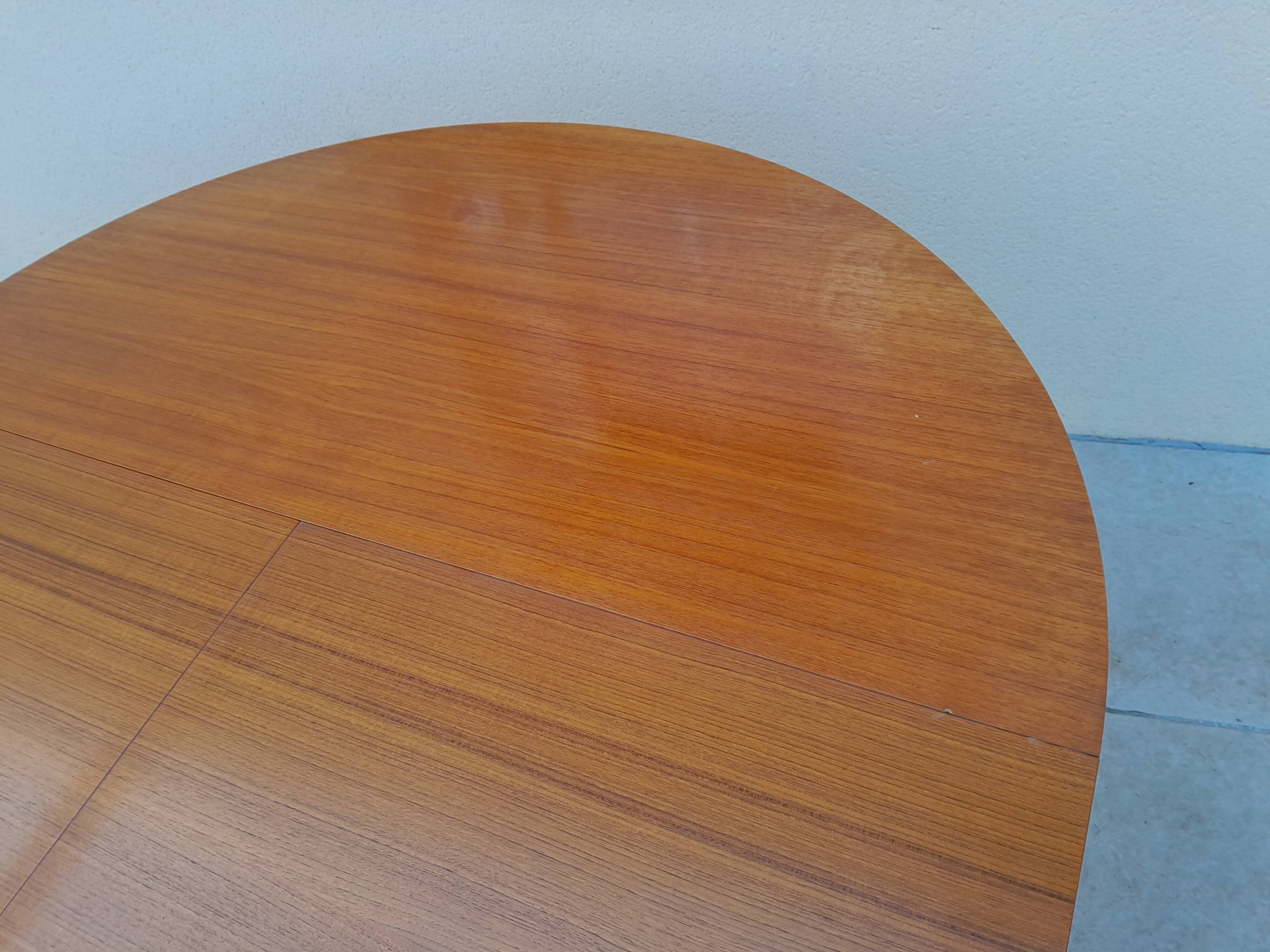 Vintage teak van pelt table from the 70s and 80s
