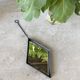 Miroir brutaliste losange en fer
