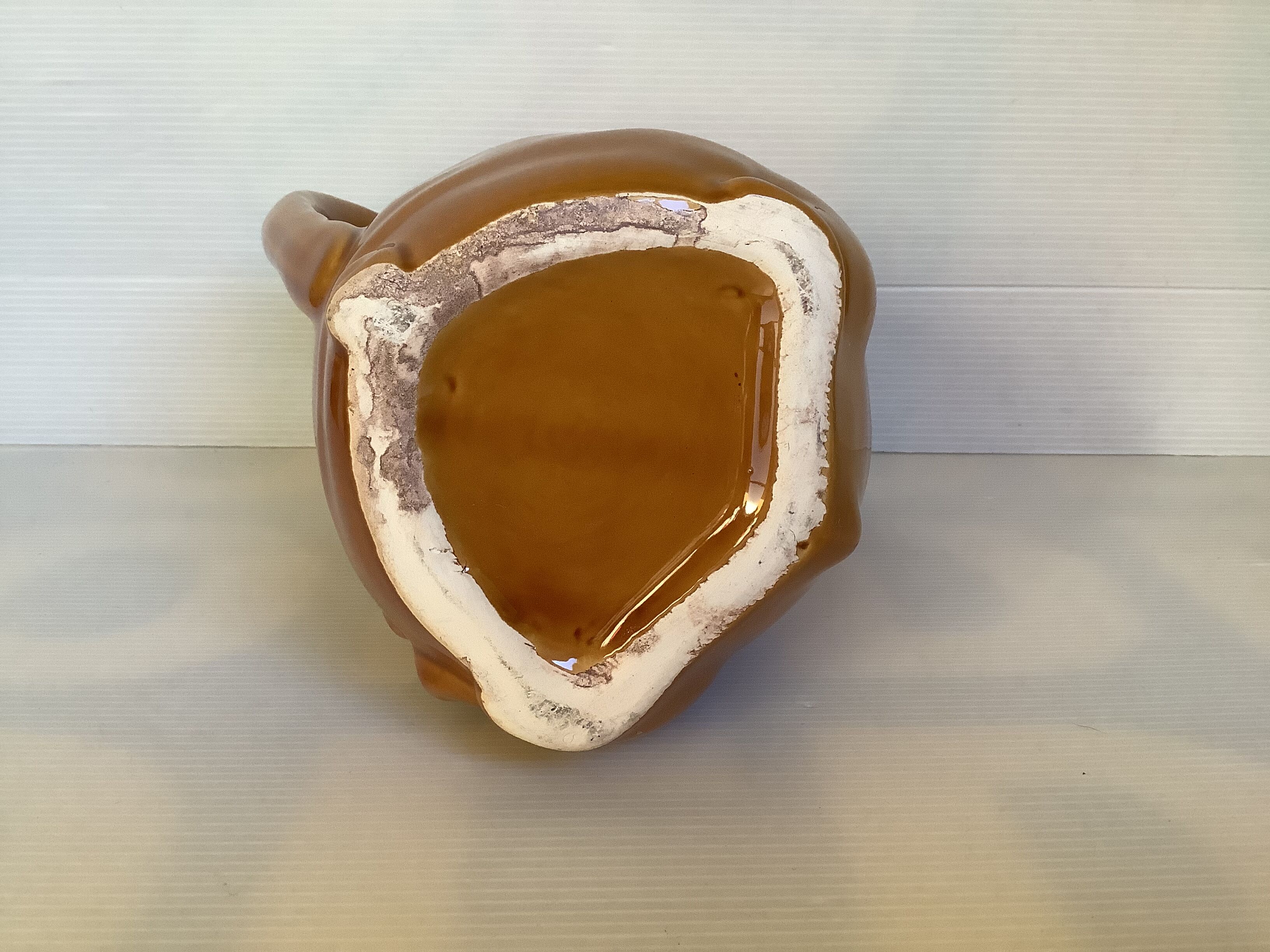 Ancient zoomorphic pig jug